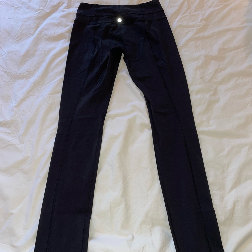 Lululemon 31" black mid rise, full length leggings, size 4